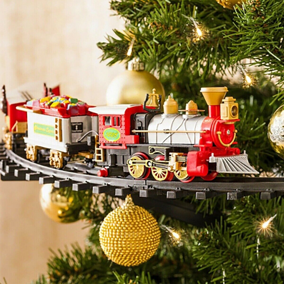 TRENINO ELETTRICO LUCI E SUONI AGGANCIABILE ALL'ALBERO DI NATALE DIAMETRO 89 CM